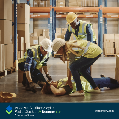 An injured worker on the floor at a Brooklyn job site