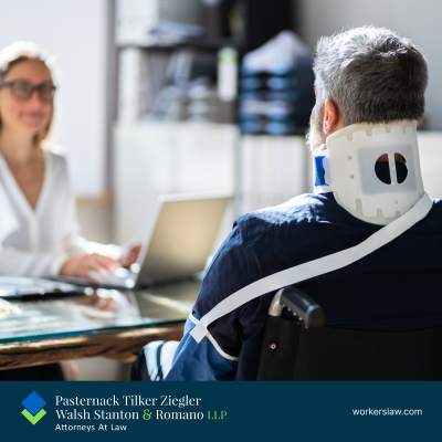 A woman at her desk across from a man with a neck injury 