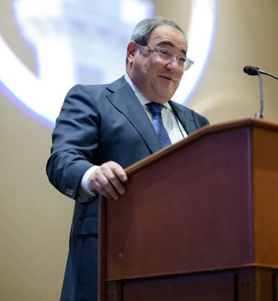 Edgar N. Romano speaking at the Workers' Injury Law & Advocacy Group (WILG). This award was presented to Romano at WILG's annual convention, held in October 2024 in Santa Barbara, California.